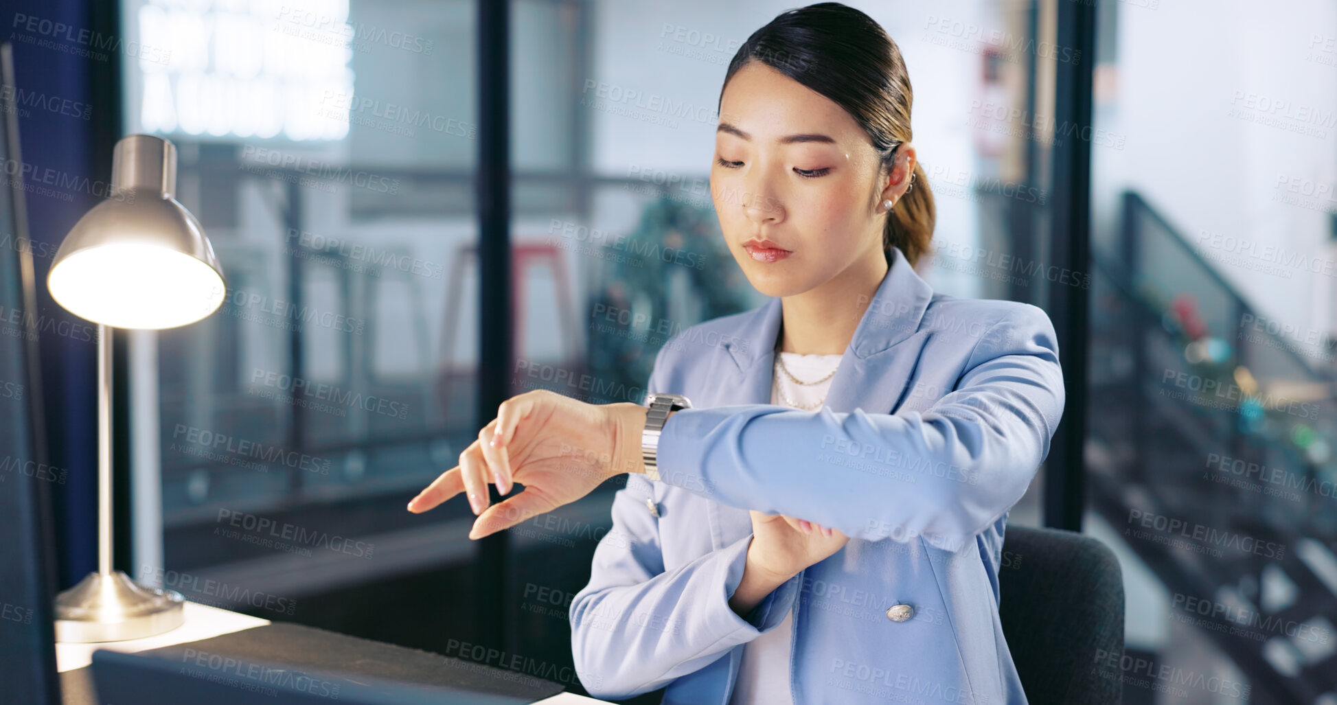 Buy stock photo Deadline, watch and business woman in office or working late for overtime on report. Professional, corporate and dedication with asian female employee at work to check time for schedule at night