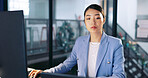 Watch, deadline and computer with a business asian woman working late at night in her office for overtime. Finance, accounting and dedication with a female employee at work in her corporate workplace