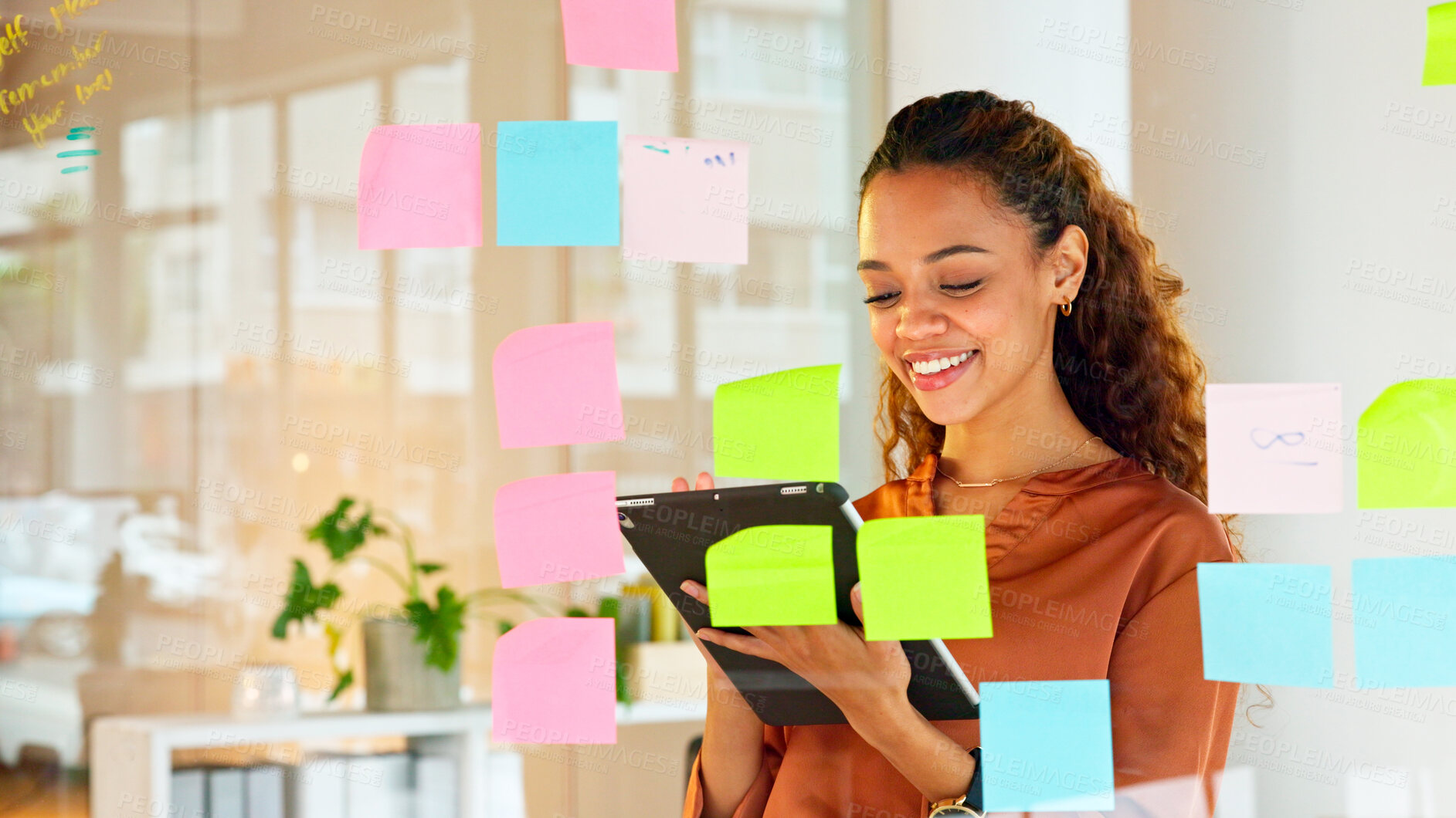 Buy stock photo Business woman, tablet and notes on glass wall with color for ideas and planning in creative office. Designer person with technology and strategy for brainstorming, management and scrum or agenda