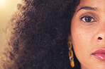 Intense first responder and medical staff member looking concerned about trauma. Closeup face and portrait of worried black healthcare professional. Young woman thinking about serious sad memories