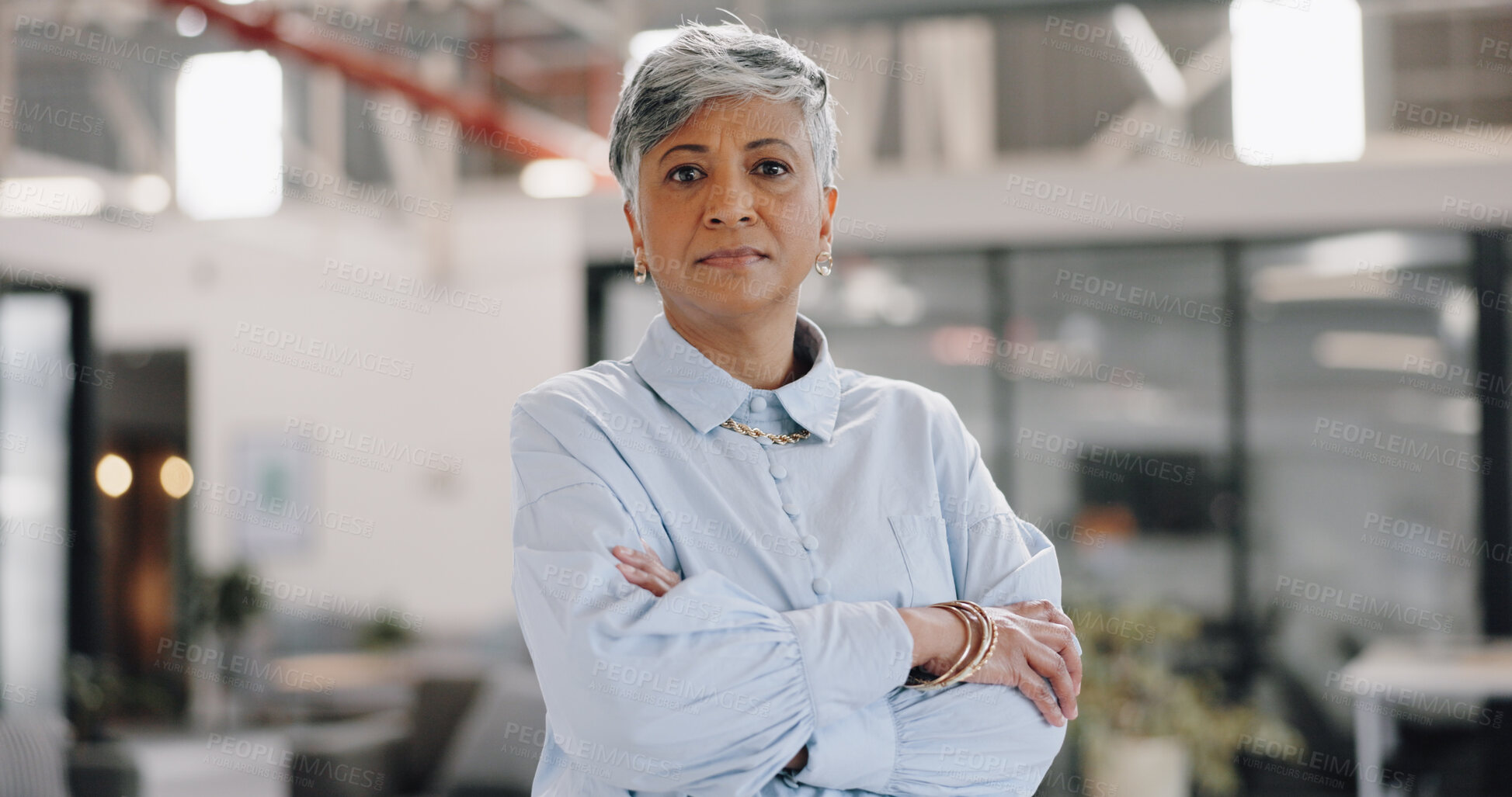 Buy stock photo Senior business woman, arms crossed and portrait with leadership, confidence and pride for career. Mature ceo lady, serious face and management job at startup, modern office or professional workplace