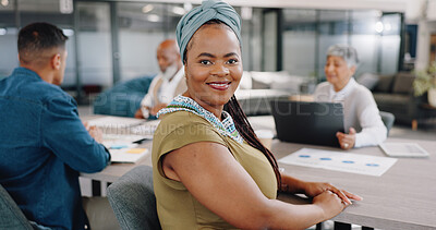 Business, portrait black woman and meeting at table for strategy and planning at financial advisory startup. Workshop, brainstorming and teamwork, face of woman with smile in meeting room with team.