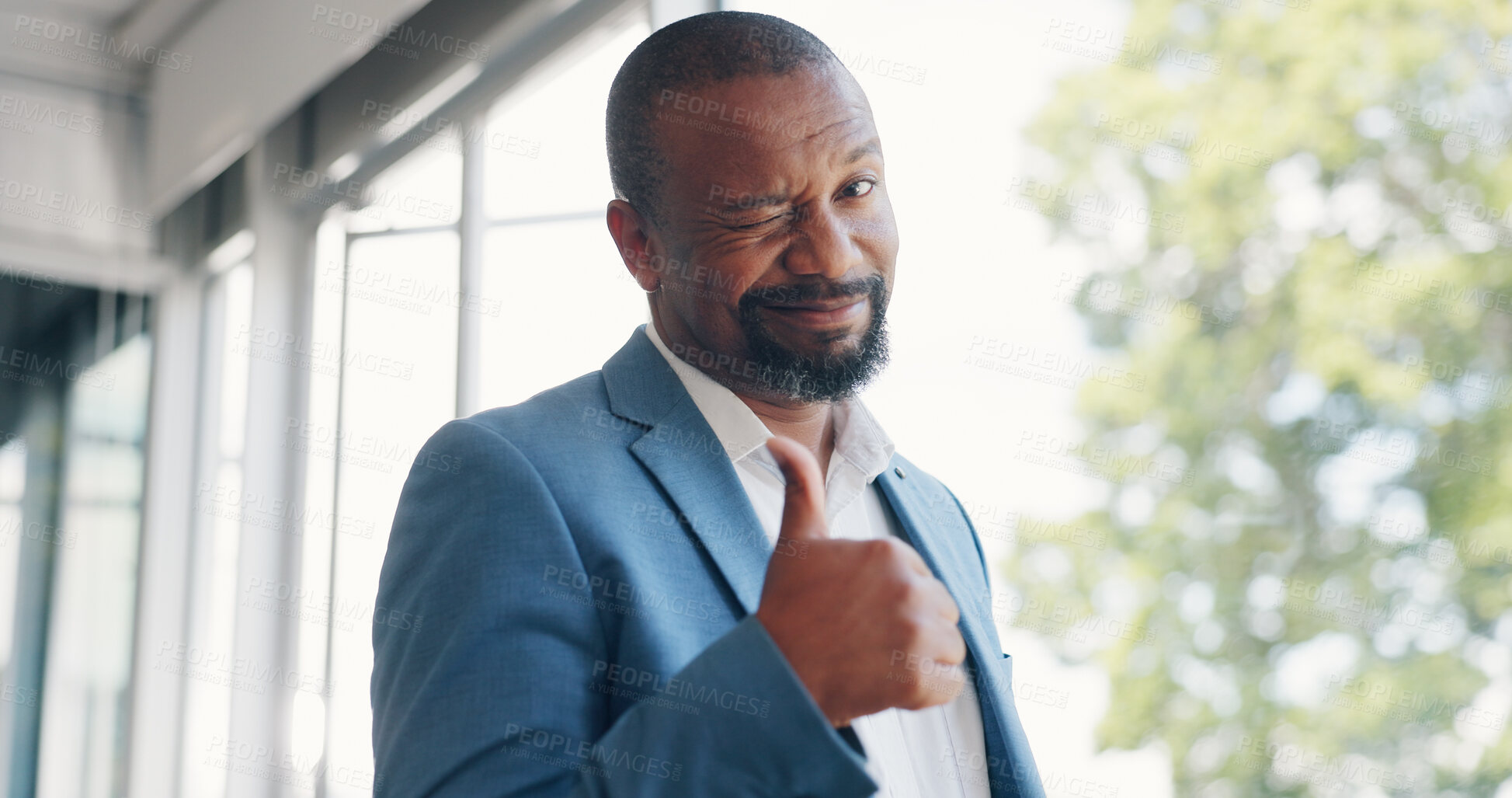 Buy stock photo Portrait, business and black man with thumbs up, wink and support with feedback, entrepreneur and approval. Face, African person or employee with hand gesture, like and agreement with icon and emoji