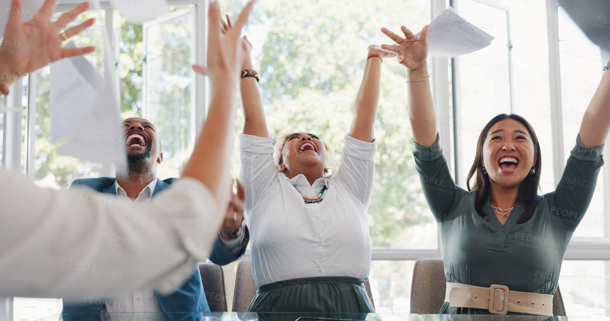 Buy stock photo Success, paper in air and business people in meeting with corporate win, celebration and cheers in office. Confetti, achievement and support with team building, happy employees coworking and bonus