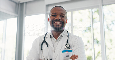 Healthcare, confidence and portrait of doctor with smile in office at hospital, black man in medical job. Proud man, leader in medicine with support, trust and leadership at clinic in South Africa.
