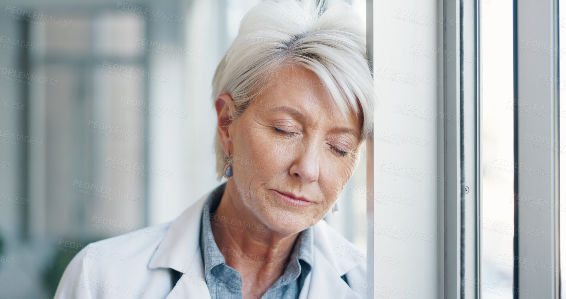 Buy stock photo Burnout, headache and tired senior woman doctor in hospital with vertigo, anxiety or brain fog problem. Healthcare, fail and elderly female surgeon exhausted, depression or mental health, fatigue