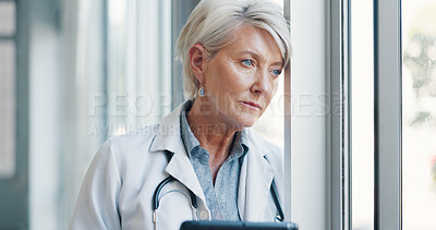 Stress, woman or doctor thinking at window with burnout in hospital office after surgery. Medicine, anxiety and mental health, senior medical professional in Canada tired from overtime or depression.