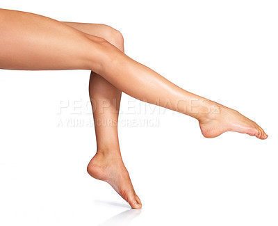 Buy stock photo Skincare, legs and woman in studio for beauty, smooth and cosmetic, grooming or treatment on white background. Smooth, leg and girl model relax on space, mockup for advertising beauty, luxury or skin