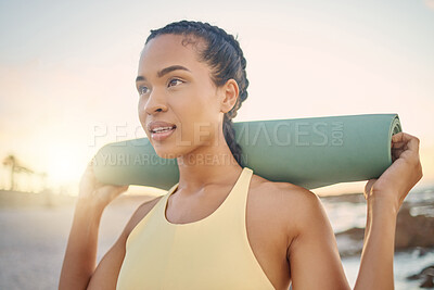 Buy stock photo Face, fitness and woman with yoga mat at beach preparing for workout, training or exercise. Zen chakra, meditation and female yogi thinking about pilates for health, wellness and mobility at sunset.