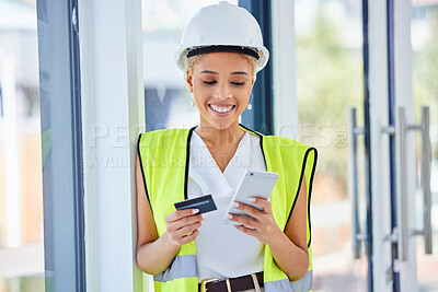 Buy stock photo Construction worker, woman and ecommerce with credit card and smartphone, happy with payment and bank. Internet, banking and online shopping with contractor, stock purchase with retail and mobile app