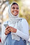 Hijab, phone and smile of a girl teenager happy outdoor with mobile connection and networking. Islam, muslim and young person ready for social media network scroll with technology and happiness