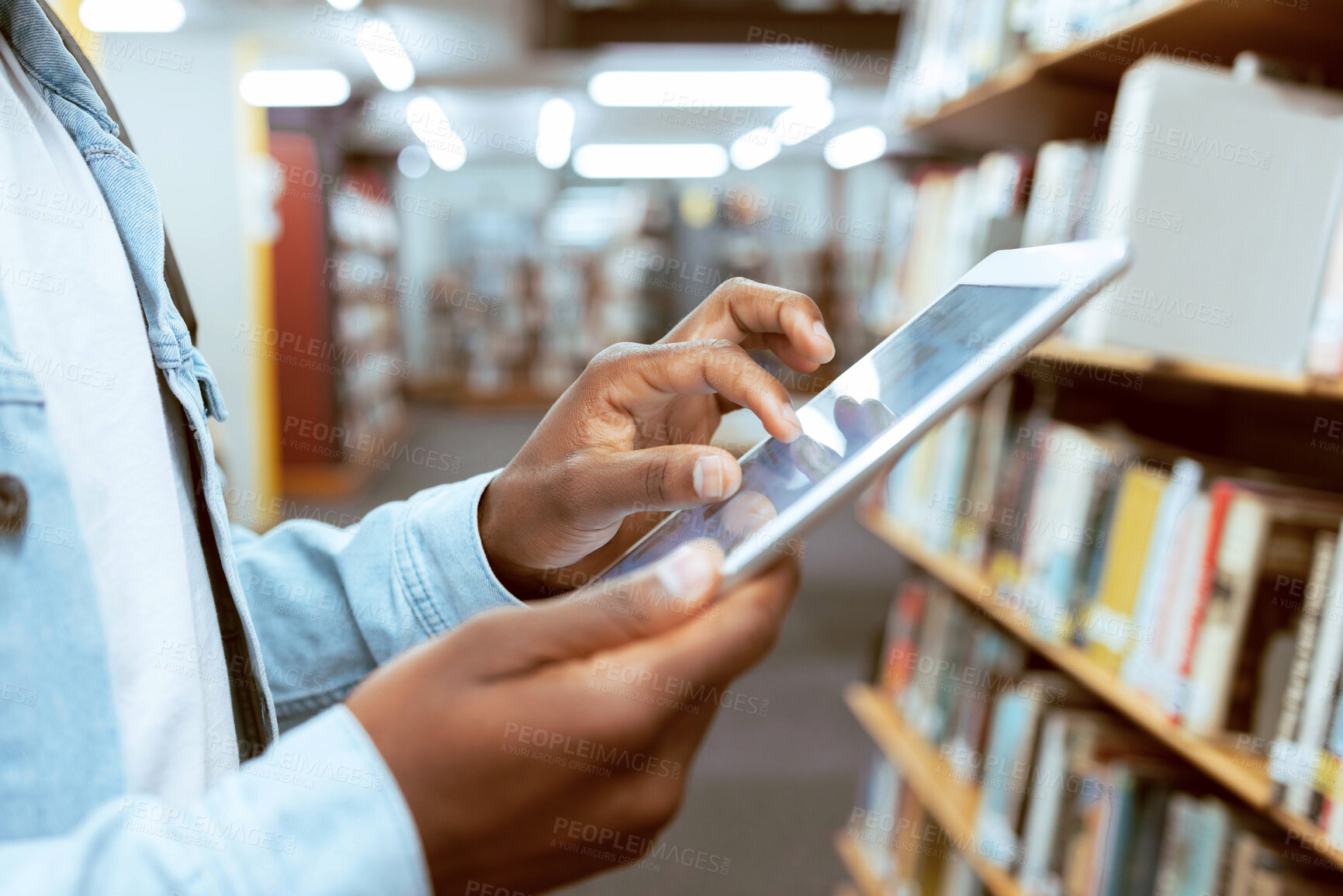 Buy stock photo Student hands, tablet zoom and library research of a black man at an education and knowledge center. University, college and study building with a person with technology looking at social media app 