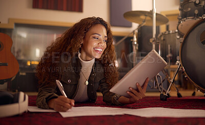 Buy stock photo Digital tablet, songwriter and woman writing idea for music, sound or composition in studio, happy and smile. Female, artist and composer online for creative, planning and audio, track and production