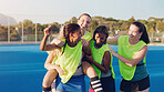 Women, hockey group and celebration on field together for support, solidarity and happy for fitness, training or goals. Sports teamwork, friends and hug from with winning goal, achievement or success