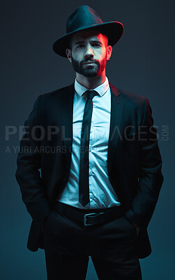 Buy stock photo Man portrait, suit or fashion on studio background in secret spy, dark isolated mafia or crime lord aesthetic. Model, gangster or serious bodyguard in stylish, trendy or tuxedo clothes in leadership