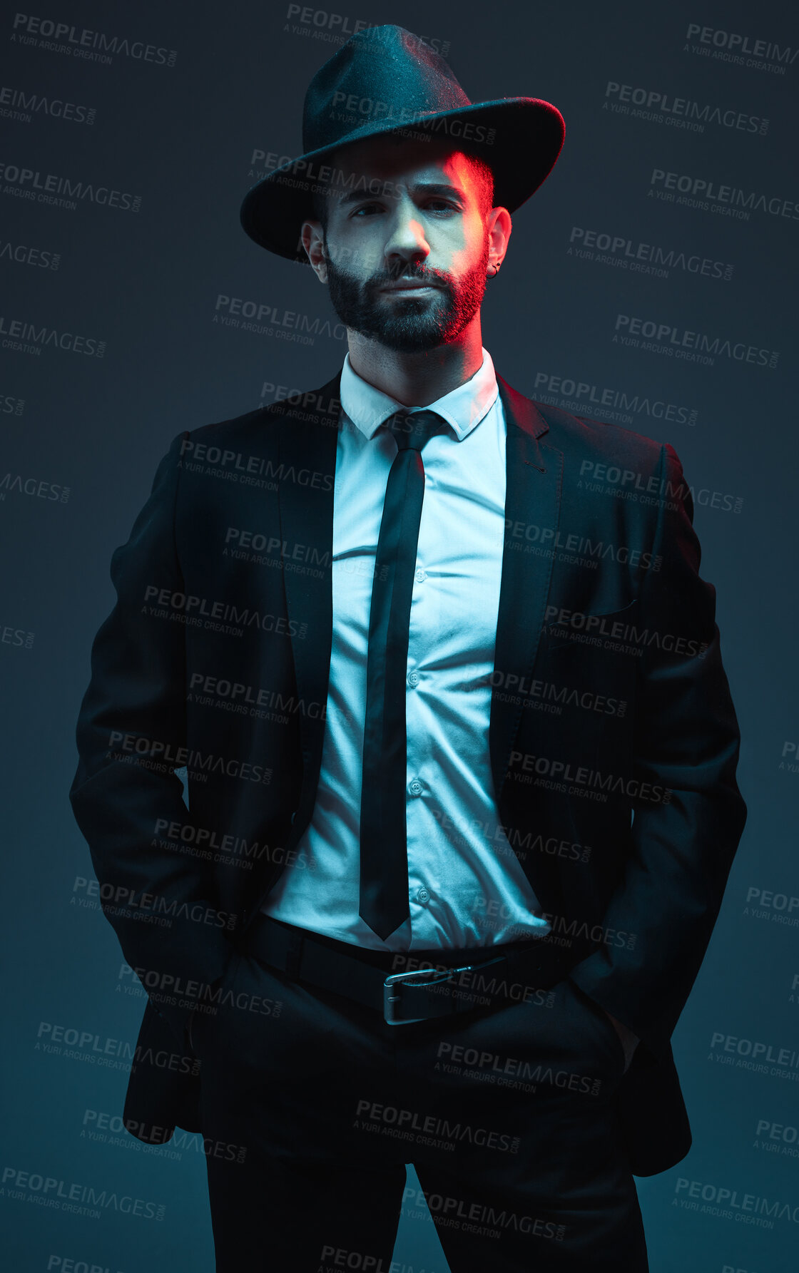 Buy stock photo Man portrait, suit or fashion on studio background in secret spy, dark isolated mafia or crime lord aesthetic. Model, gangster or serious bodyguard in stylish, trendy or tuxedo clothes in leadership