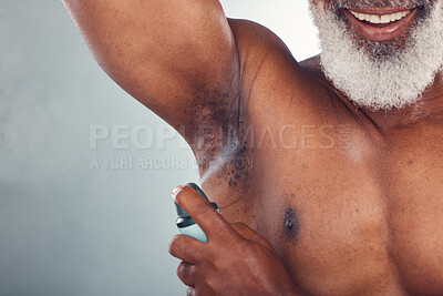 Buy stock photo Old man, spray armpit with skin and smile for beauty, grooming and hygiene isolated on studio background. Happiness, wellness and skincare, cosmetic product and topless with deodorant and fragrance