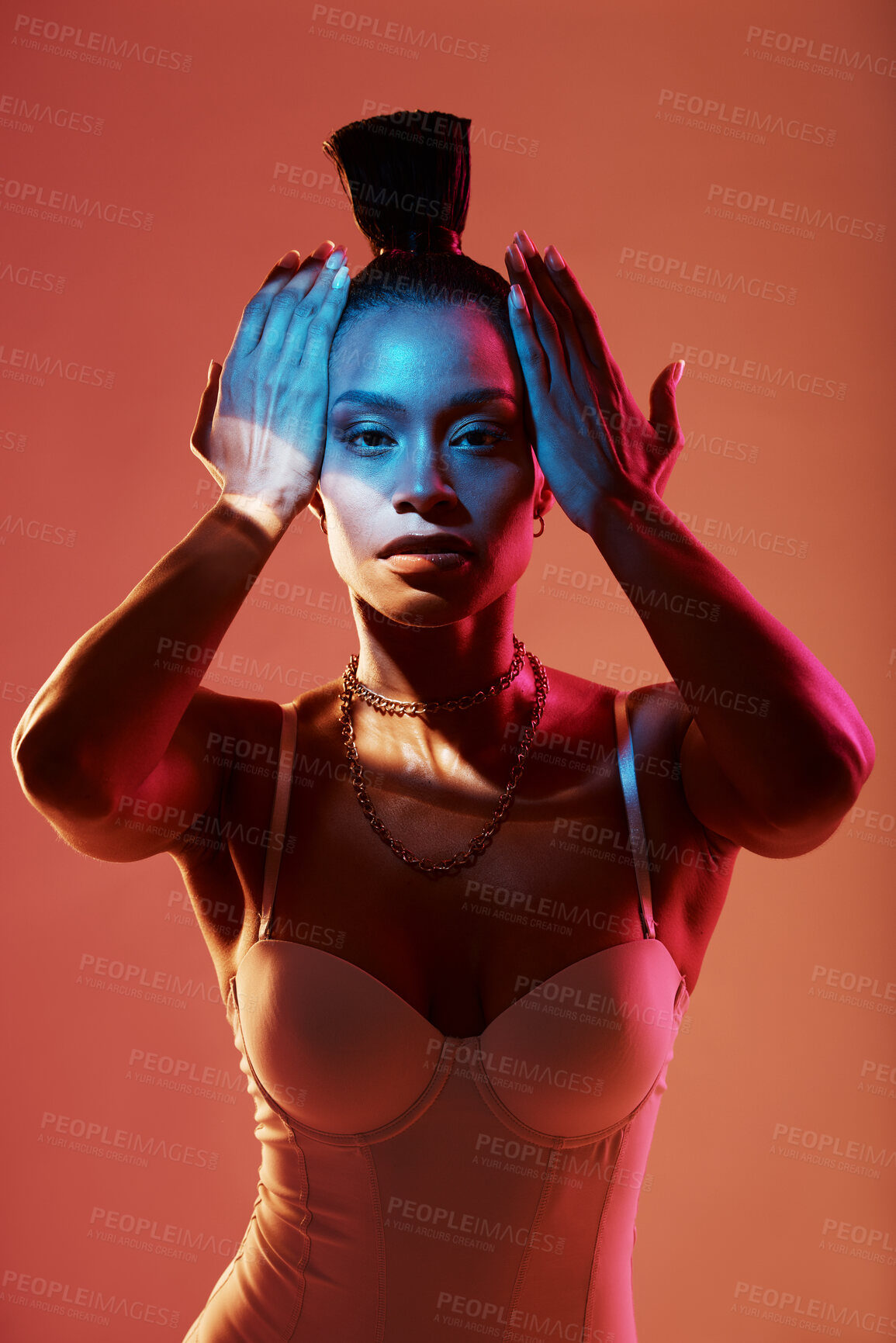 Buy stock photo Portrait, fashion and neon with a model black woman in studio on a kaleidoscope background for beauty. Art, makeup and style with an attractive young female posing indoor for culture or cosmetics