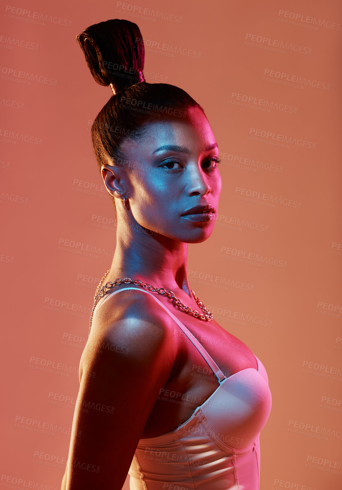 Buy stock photo Portrait, fashion and hair with a model black woman in studio on a neon background for beauty. Art, hairstyle and style with an attractive young female posing indoor for culture or cosmetics