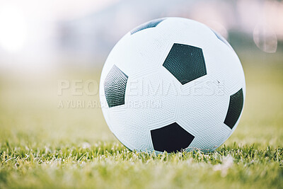 Buy stock photo Soccer, ball and field for sports game time or match start in athletics or football tournament in the outdoors. Round sphere object with pentagon shape spots on green grass for sport on mockup