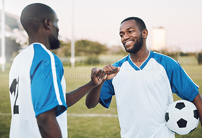 Buy stock photo Fist bump, soccer ball and black man with teamwork success of sports training on a grass field. Football friends, support and exercise with fitness motivation outdoor for health workout and smile