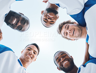 Buy stock photo Portrait, sports and a soccer team in a huddle from a low angle against a blue sky for a game. Teamwork, collaboration and fitness with a football player group standing in a circle before a match