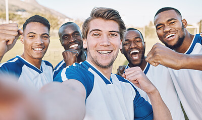 Buy stock photo Fist, soccer and portrait of a team selfie at training, game or competition on a field. Fitness, diversity and strong football players with a photo after winning, achievement and sports in France