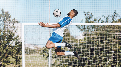 Buy stock photo Sports, soccer and man jump with ball playing game, training and exercise on outdoor field. Fitness, workout and male football player for defence, goalkeeper and in action for goals in competition