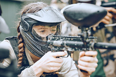 Buy stock photo Paintball, gun and woman with helmet aim for shooting ready for game, arena match and battlefield. Extreme sports, military adventure and girl with weapon in camouflage, action and safety gear
