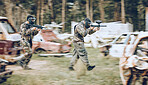 Paintball, team running and soldier group energy for military, army and field game training. Exercise, fitness and target shooting of a battlefield players in a sports event outdoor with focus