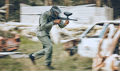 Buy stock photo Paintball, speed or man running in a shooting game playing with fast war action on a fun battlefield. Mission focus, military or guy with a gun or weapon gear for survival in an outdoor competition