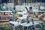 Paintball, winner and soldier with gun and fist pump, victory on battlefield with military man, fitness and winning game. Sport, achievement and yes in camouflage, celebration and war win outdoor