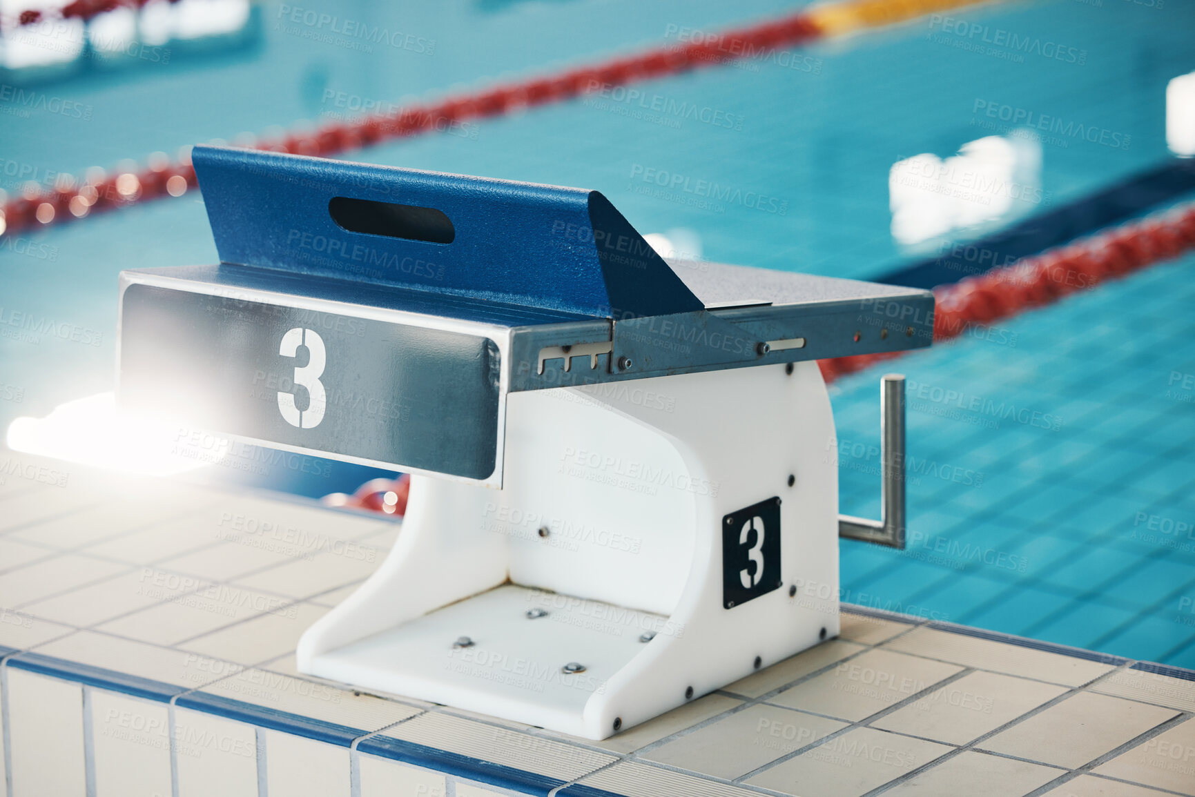 Buy stock photo Swimming, sports and podium number by pool for training, exercise and workout for triathlon competition. Fitness, motivation and three on empty starting board board for swimmer, diving and race