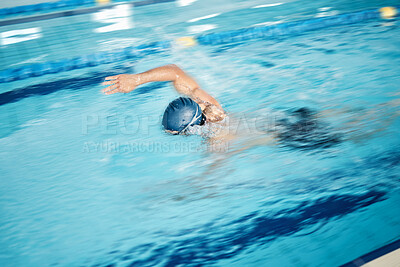 Buy stock photo Man, motion blur or freestyle stroke in swimming pool for sports wellness, training or exercise for body healthcare. Workout, fitness or speed swimmer athlete in water competition or cardio challenge