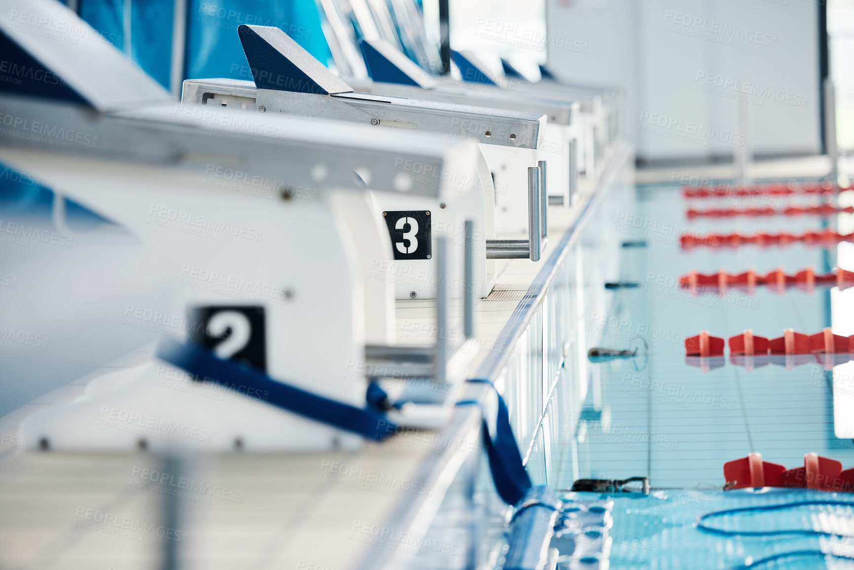 Buy stock photo Sports, competition and podium row by swimming pool for training, exercise and workout for water sport. Fitness mockup, motivation and professional starting block for diving, triathlon and race
