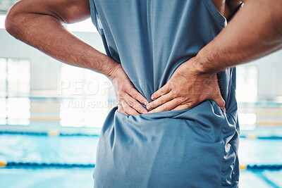 Buy stock photo Back pain, sports and hands of man by swimming pool with injury, muscle ache and inflammation. Wellness, support and athlete with accident, health problem or bruise from fitness, exercise or training