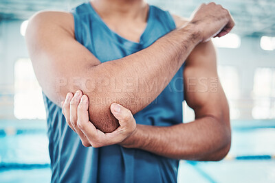 Buy stock photo Swimming pool, sports and man with elbow pain from injury, muscle ache and joint inflammation. Arthritis, medical aid and male hands with accident, strain or bruise from fitness, exercise or training