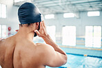 Athlete, ready or swimmer hands with cap or pool gear and sports wellness, body muscle or mindset in water competition. Training, workout or exercise for swimming man with fitness goals or healthcare