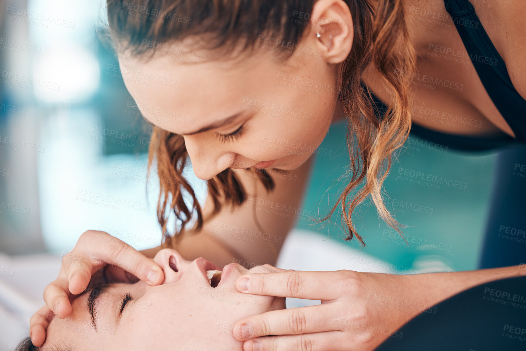 Buy stock photo Pool, lifeguard and cpr to help drowning victim, emergency first aid training with women for safety. Swimming, teaching and learning safe healthcare from instructor, help saving lives at water sports