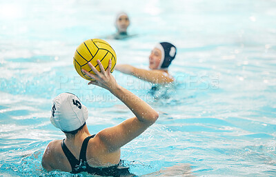 Sports, swimming pool and girl with ball for water polo for training, exercise and fitness with team. Professional sport, teamwork and female athlete focus for winning game, competition and match