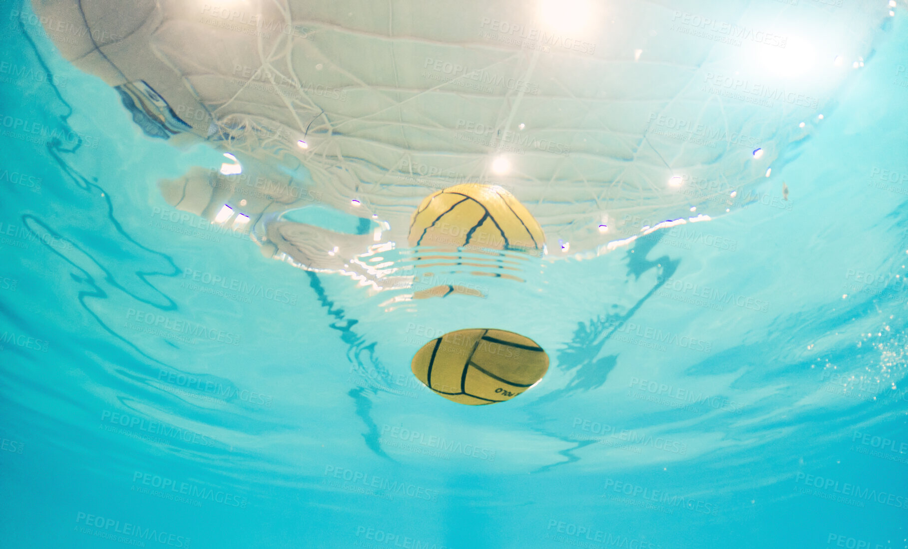 Buy stock photo Water polo, sport and ball in a pool from below with equipment floating on the surface during a competitive game. Fitness, training and exercise while a still life object floats during a match