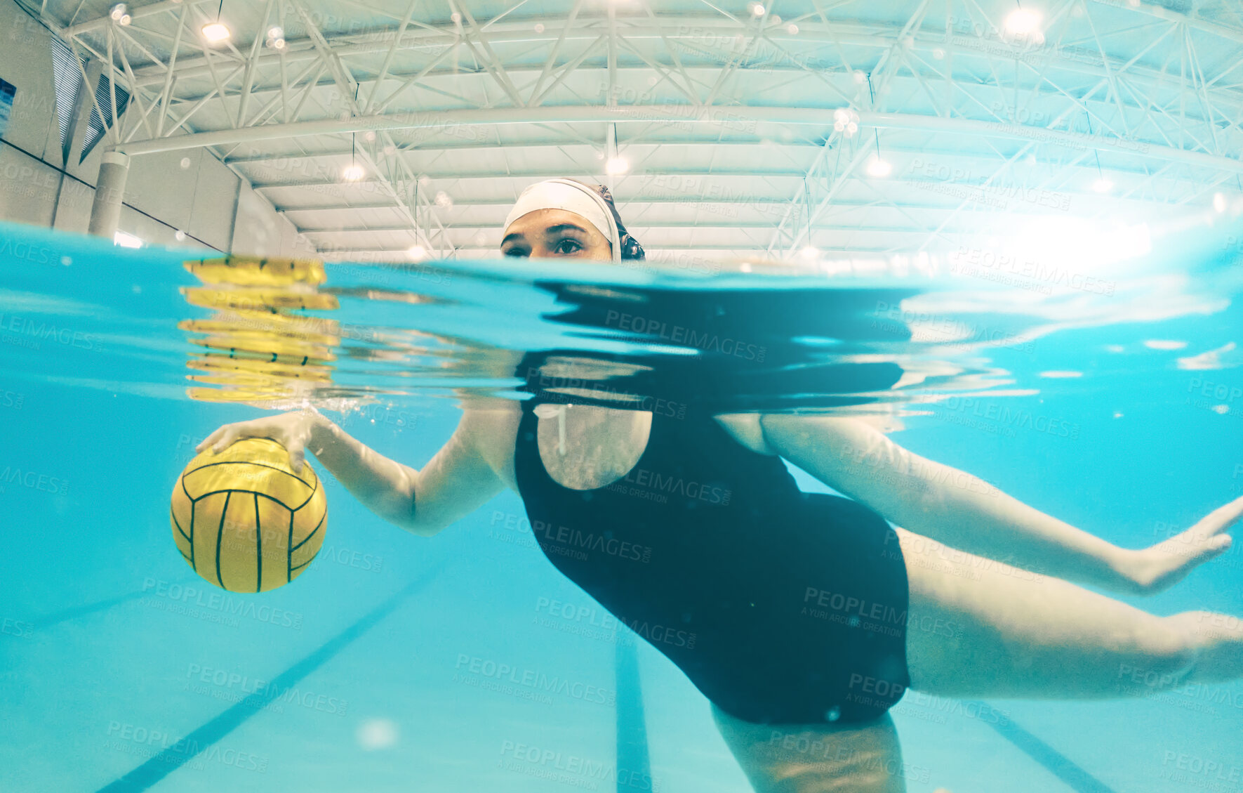 Buy stock photo Water polo, sports and woman in swimming pool for game, competition and match practice. Professional sport, fitness and girl athlete below aqua surface with ball for training, exercise and workout