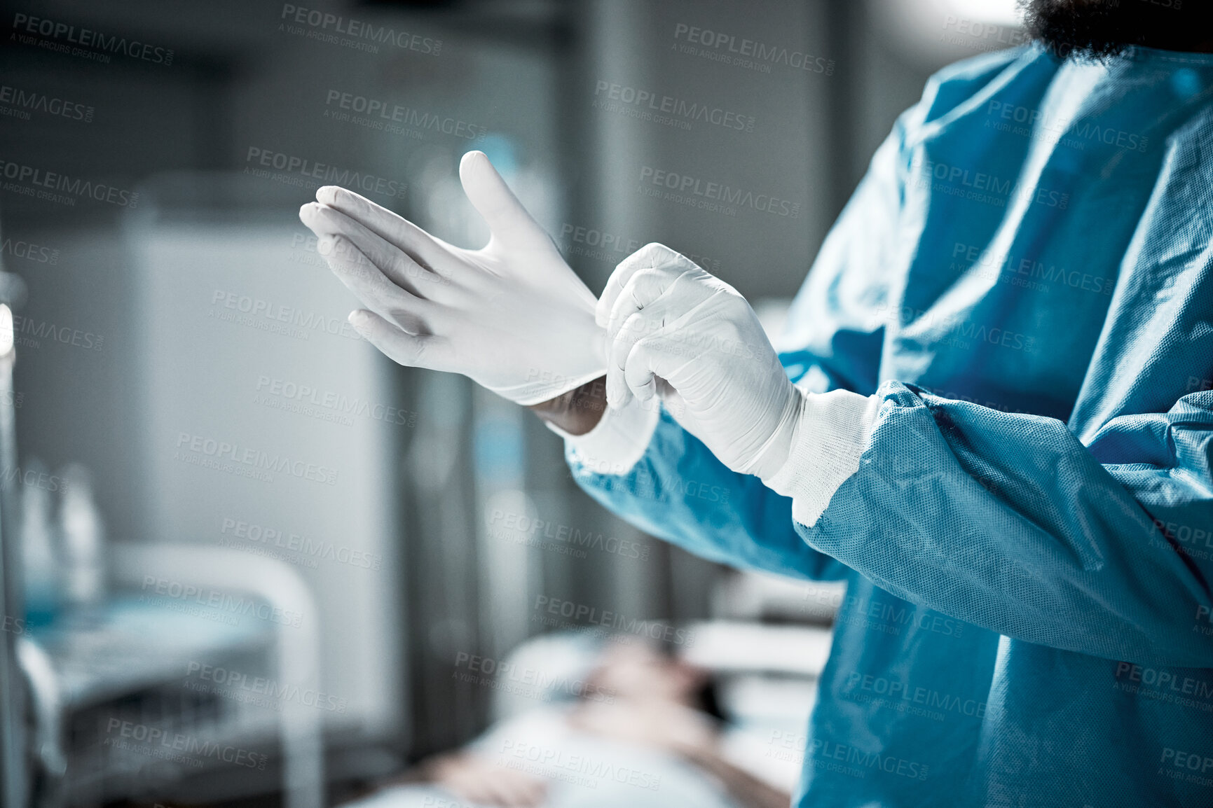 Buy stock photo Hands, latex gloves and surgeon preparing for operation in a consultation room in the hospital. Healthcare, surgical and medical doctor ready for surgery in ER or emergency theatre in medicare clinic