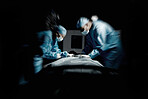 Doctors, night surgery and hospital theater with patient and surgeon team for emergency, teamwork and trust. Medical man and woman in dark for life saving, healthcare and health insurance emergency