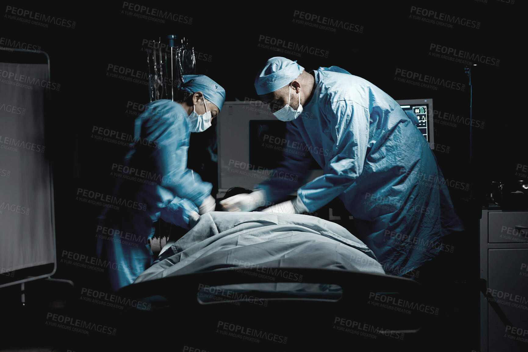 Buy stock photo Healthcare, medical and team of surgeons doing surgery on a patient for an emergency operation in the hospital. Collaboration, group and doctors operating in a surgical room in the medicare clinic.