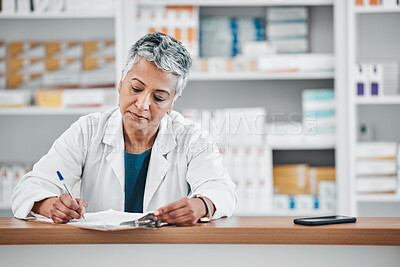 Buy stock photo Senior woman, pharmacist writing and paper data of pharmacy stock or insurance documents. Healthcare, doctor and elderly female wellness consultant with store logistics research about shop products