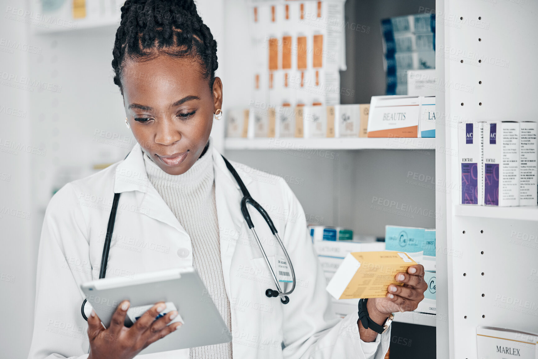 Buy stock photo Tablet, pharmacy and pharmacist doing research on medication or pill box for treatment or cure. Healthcare, pharmaceutical and black woman chemist checking prescription medicine in a drugstore.