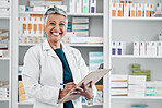 Elderly woman, pharmacist portrait smile and store data of pills stock, insurance or medical documents. Healthcare, doctor and senior female wellness consultant with happiness about pharmacy