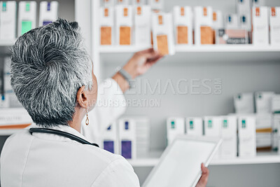 Buy stock photo Tablet, pharmacy and medicine with senior woman and mockup in store for healthcare, wellness or retail. Product, digital and medical with pharmacist and shelf for shopping, prescription or inventory