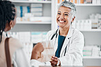 Senior pharmacist with pills for a sick black woman in a pharmacy for retail healthcare treatment. Smile, trust or happy mature doctor helping a customer shopping for medication, medicine or drugs